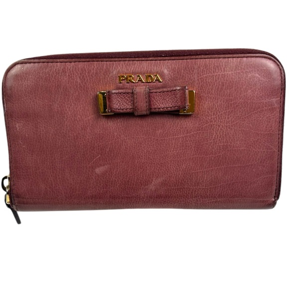 Prada Handbags - Prada Pink Zippy Wallet with Bow